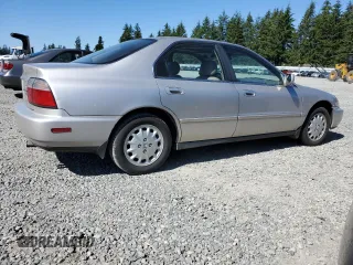 1996 Honda Accord EX with VIN 1HGCD5668TA091433, listed as a Copart auction lot 59375654 with 317,499 mi miles and Clean Title. Bid and sale history available at DreamBid. Image 3.
