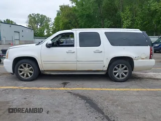 2011 GMC Yukon XL Denali z VIN 1GKS2MEF2BR190877, wystawiony jako IAAI lot #42364202 z przebiegiem 160 063 mil mil oraz . Historia ofert i sprzedaży dostępna na DreamBid. Obrazek 14.