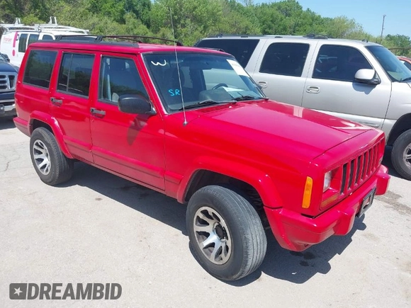 1998 Jeep Cherokee Sport with VIN 1J4FT68S2WL256846, listed as a IAAI auction lot 41998490 with 198,936 mi miles. Bid and sale history available at carsss.com. Image 1.