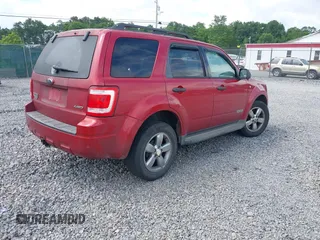 2008 Ford Escape XLT with VIN 1FMCU93188KD07261, listed as a IAAI auction lot 42633109 with 250,178 mi miles and . Bid and sale history available at DreamBid. Image 4.