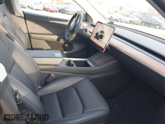 2023 Tesla Model Y Long Range with VIN 7SAYGAEEXPF612231, listed as a IAAI auction lot 41758243 with 32,924 mi miles and . Bid and sale history available at DreamBid. Image 5.