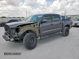 2018 Toyota Tacoma SR z VIN 5TFAX5GN6JX110493, wystawiony jako Copart lot #61683585 z przebiegiem 134 598 mil mil oraz Szkoda całkowita • Salvage title. Historia ofert i sprzedaży dostępna na DreamBid. Obrazek 1.