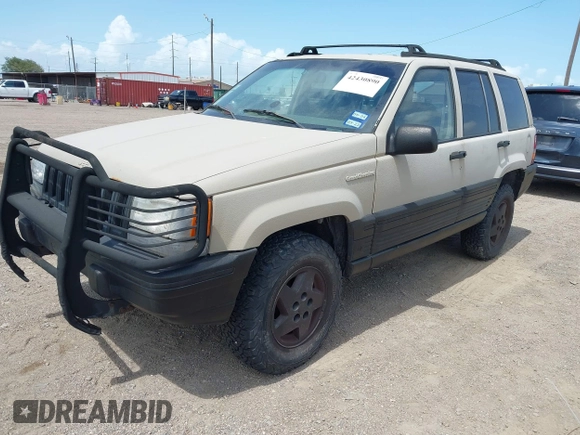 1995 Jeep Grand Cherokee Laredo with VIN 1J4GZ58Y5SC541987, listed as a IAAI auction lot 42430890 with 246,824 mi miles and . Bid and sale history available at DreamBid. Image 2.