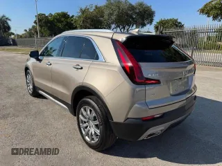 2023 Cadillac XT4 AWD Premium Luxury z VIN 1GYFZDR40PF108407, wystawiony jako Copart lot #47146185 z przebiegiem 8 724 mil mil oraz Nie do naprawy • Non repairable. Historia ofert i sprzedaży dostępna na DreamBid. Obrazek 2.