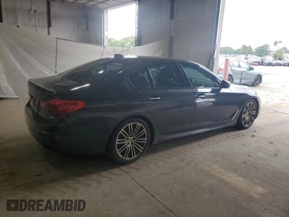2018 BMW 5 Series M550i xDrive with VIN WBAJB9C58JB035267, listed as a Copart auction lot 64616605 with 125,365 mi miles and Clean title. Bid and sale history available at DreamBid. Image 3.
