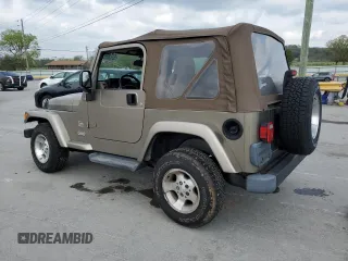 2003 Jeep Wrangler Sahara with VIN 1J4FA59S13P312830, listed as a Copart auction lot 52730955 with 99,247 mi miles and Salvage title. Bid and sale history available at DreamBid. Image 2.