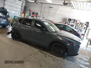 2023 Mazda CX-5 2.5 S Carbon Edition with VIN JM3KFBCM8P0211434, listed as a IAAI auction lot 41804865 with 24,289 mi miles. Bid and sale history available at carsss.com. Image 1.