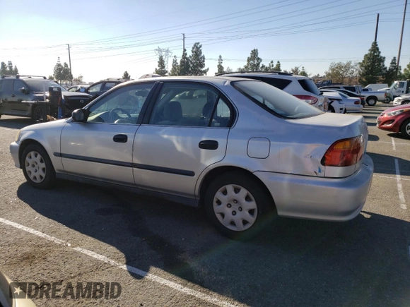 1999 Honda Civic LX with VIN 2HGEJ6571XH552867, listed as a Copart auction lot 81715654 with 234,544 mi miles and Salvage Title. Bid and sale history available at DreamBid. Image 2.