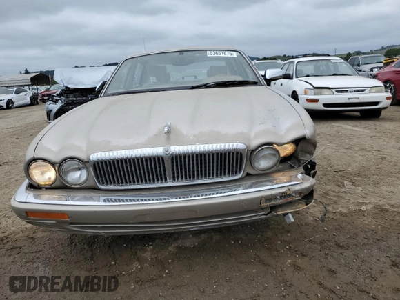 1997 Jaguar XJ Vanden Plas with VIN SAJKX6245VC800386, listed as a Copart auction lot 53651675 with 158,185 mi miles and Salvage Title. Bid and sale history available at DreamBid. Image 5.