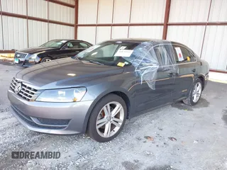 2014 Volkswagen Passat SE z VIN 1VWBN7A32EC059503, wystawiony jako IAAI lot #40876045 z przebiegiem Nie podano mil oraz . Historia ofert i sprzedaży dostępna na DreamBid. Obrazek 2.