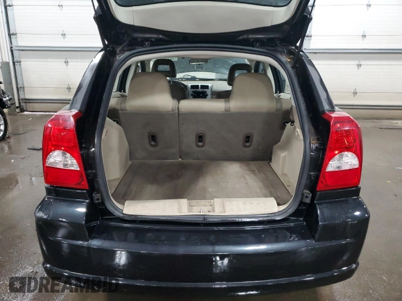 2008 Dodge Caliber SE z VIN 1B3HB28B58D717630, wystawiony jako Copart lot #46232175 z przebiegiem 242 361 mil mil oraz Nie do naprawy • Non repairable. Historia ofert i sprzedaży dostępna na DreamBid. Obrazek 6.