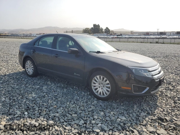 2010 Ford Fusion Hybrid with VIN 3FADP0L35AR199816, listed as a Copart auction lot 61641495 with 146,871 mi miles and Salvage title. Bid and sale history available at DreamBid. Image 4.