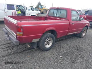 1997 Ford Ranger XLT with VIN 1FTCR10A4VUC65392, listed as a IAAI auction lot 41993646 with 208,789 mi miles. Bid and sale history available at carsss.com. Image 4.