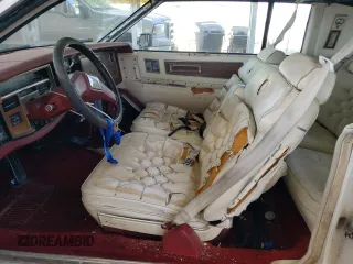 1983 Cadillac Eldorado z VIN 1G6AL5787DE628931, wystawiony jako Copart lot #73113774 z przebiegiem 28 559 mil mil oraz Tytuł czysty. Historia ofert i sprzedaży dostępna na DreamBid. Obrazek 7.