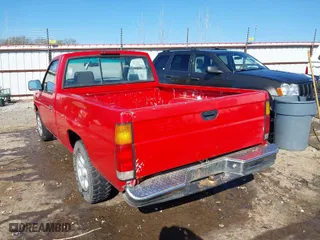 1997 Nissan Trucks 2WD XE with VIN 1N6SD11S7VC381268, listed as a IAAI auction lot 41957657 with 215,483 mi miles. Bid and sale history available at carsss.com. Image 3.