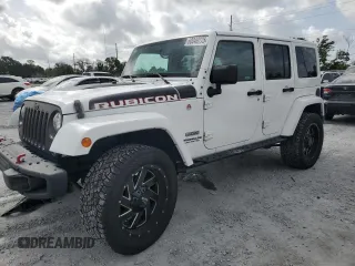2017 Jeep Wrangler Unlimited Rubicon z VIN 1C4HJWFG6HL692928, wystawiony jako Copart lot #60049775 z przebiegiem 145 033 mil mil oraz Nie do naprawy • Non repairable. Historia ofert i sprzedaży dostępna na DreamBid. Obrazek 1.