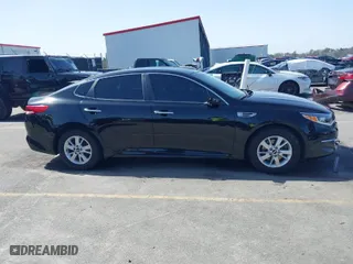 2018 Kia Optima S with VIN 5XXGT4L36JG221671, listed as a IAAI auction lot 41704040 with 136,815 mi miles. Bid and sale history available at carsss.com. Image 13.