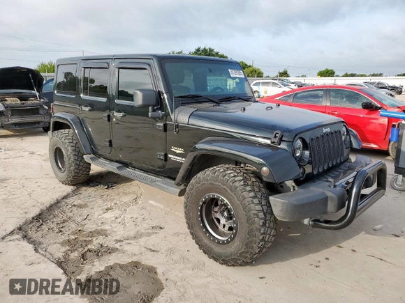 2012 Jeep Wrangler Unlimited Altitude with VIN 1C4HJWEGXCL180602, listed as a Copart auction lot 61391095 with 187,205 mi miles and Salvage title. Bid and sale history available at DreamBid. Image 4.
