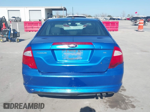 2012 Ford Fusion SE z VIN 3FAHP0HA9CR395009, wystawiony jako IAAI lot #41855650 z przebiegiem 178 901 mil mil oraz . Historia ofert i sprzedaży dostępna na DreamBid. Obrazek 17.