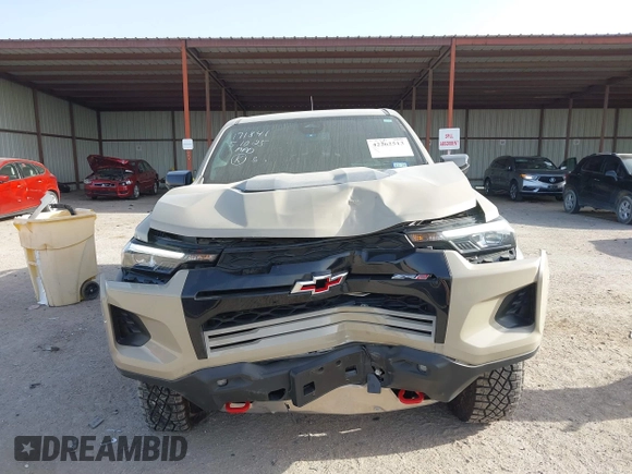 2024 Chevrolet Colorado 4WD ZR2 z VIN 1GCPTFEK4R1145701, wystawiony jako IAAI lot #42262513 z przebiegiem 8 666 mil mil oraz . Historia ofert i sprzedaży dostępna na DreamBid. Obrazek 12.