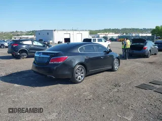 2012 Buick LaCrosse Premium 1 z VIN 1G4GD5E35CF282278, wystawiony jako IAAI lot #42146380 z przebiegiem 92 968 mil mil oraz . Historia ofert i sprzedaży dostępna na DreamBid. Obrazek 4.