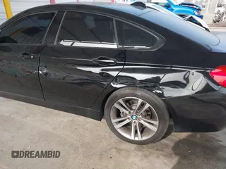 2015 BMW 4 Series 428i with VIN WBA4A9C52FGL85228, listed as a IAAI auction lot 41228043 with 152,729 mi miles and . Bid and sale history available at DreamBid. Image 6.