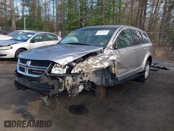 2015 Dodge Journey SE z VIN 3C4PDCAB3FT641675, wystawiony jako IAAI lot #41898611 z przebiegiem 218 121 mil mil oraz . Historia ofert i sprzedaży dostępna na DreamBid. Obrazek 6.