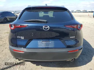 2023 Mazda CX-30 S Premium with VIN 3MVDMBDM7PM543849, listed as a Copart auction lot 54852415 with 20,898 mi miles and Salvage title. Bid and sale history available at DreamBid. Image 6.