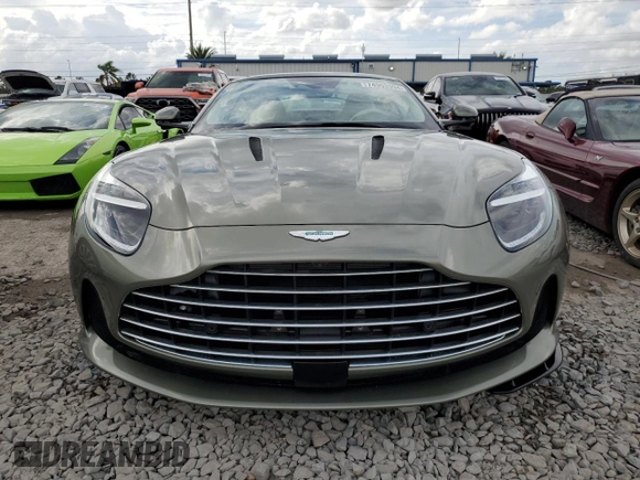 2025 Aston Martin DB12 z VIN SCFRMFFW4SGL15065, wystawiony jako Copart lot #74953394 z przebiegiem Nie podano mil oraz Nie do naprawy. Historia ofert i sprzedaży dostępna na DreamBid. Obrazek 5.