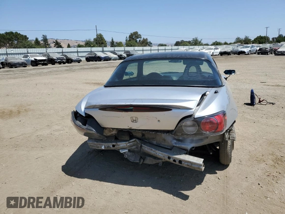 2002 Honda S2000 z VIN JHMAP11442T000235, wystawiony jako Copart lot #59429155 z przebiegiem 142 845 mil mil oraz Szkoda całkowita • Salvage title. Historia ofert i sprzedaży dostępna na DreamBid. Obrazek 6.
