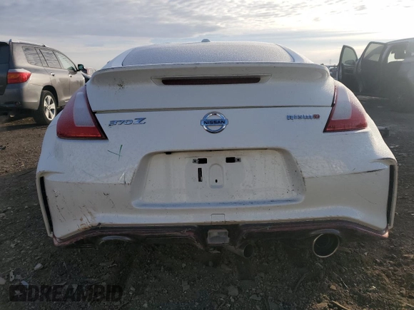 2016 Nissan 370Z z VIN JN1AZ4EH2GM935381, wystawiony jako Copart lot #83220624 z przebiegiem 56 907 mil mil oraz Szkoda całkowita • Salvage title. Historia ofert i sprzedaży dostępna na DreamBid. Obrazek 6.