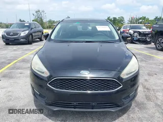 2015 Ford Focus SE with VIN 1FADP3F21FL209221, listed as a IAAI auction lot 42716293 with 100,465 mi miles and . Bid and sale history available at DreamBid. Image 6.