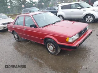1990 Nissan Sentra z VIN JN1GB21B5LU503902, wystawiony jako IAAI lot #42358723 z przebiegiem 172 484 mil mil oraz . Historia ofert i sprzedaży dostępna na DreamBid. Obrazek 1.