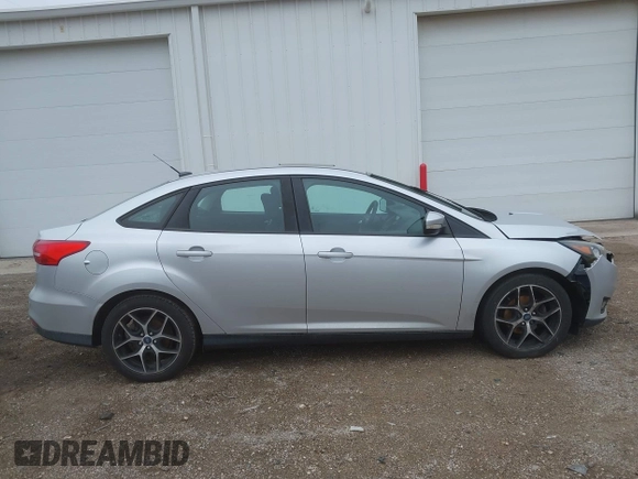 2017 Ford Focus SEL with VIN 1FADP3H20HL209209, listed as a IAAI auction lot 41921883 with 155,611 mi miles. Bid and sale history available at carsss.com. Image 13.