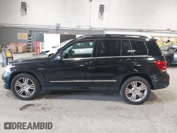2015 Mercedes-Benz GLK with VIN WDCGG8JB0FG364079, listed as a IAAI auction lot 42096003 with 113,571 mi miles. Bid and sale history available at carsss.com. Image 14.