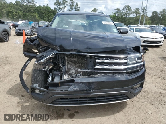 2019 Volkswagen Atlas SE with VIN 1V2DR2CA7KC605849, listed as a Copart auction lot 55557865 with 74,410 mi miles and Salvage title. Bid and sale history available at DreamBid. Image 5.