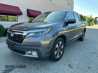 2019 Honda Ridgeline RTL-E with VIN 5FPYK3F71KB009532, listed as a Copart auction lot 65827935 with 217,177 mi miles and Clean title. Bid and sale history available at DreamBid. Image 2.