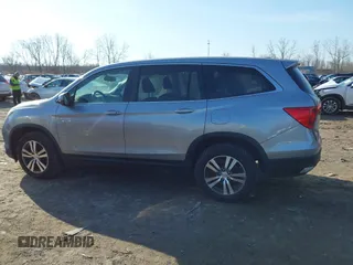 2017 Honda Pilot EX-L with VIN 5FNYF6H50HB059096, listed as a IAAI auction lot 41757214 with 165,651 mi miles and . Bid and sale history available at DreamBid. Image 14.