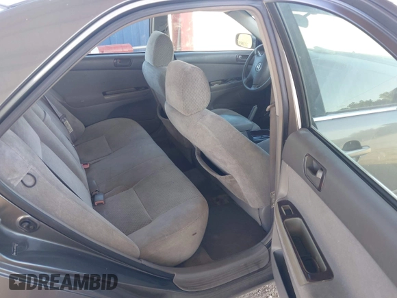 2004 Toyota Camry LE with VIN 4T1BE32KX4U916477, listed as a IAAI auction lot 42018299 with 149,247 mi miles. Bid and sale history available at carsss.com. Image 8.