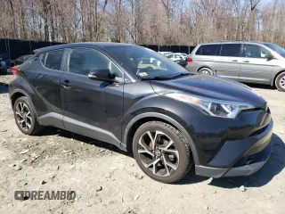 2019 Toyota C-HR XLE with VIN JTNKHMBX9K1062217, listed as a Copart auction lot 48850575 with 80,260 mi miles and Salvage Title. Bid and sale history available at DreamBid. Image 4.