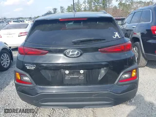 2021 Hyundai Kona SEL with VIN KM8K22AA1MU605029, listed as a IAAI auction lot 41478328 with 57,429 mi miles. Bid and sale history available at carsss.com. Image 16.