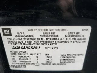 2006 GMC Envoy SLT with VIN 1GKDT13S862238613, listed as a Copart auction lot 70585704 with 147,337 mi miles and Salvage Title. Bid and sale history available at carsss.com. Image 13.