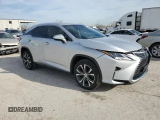 2017 Lexus RX with VIN 2T2BZMCA8HC094328, listed as a Copart auction lot 85038414 with 124,485 mi miles and Salvage Title. Bid and sale history available at carsss.com. Image 4.