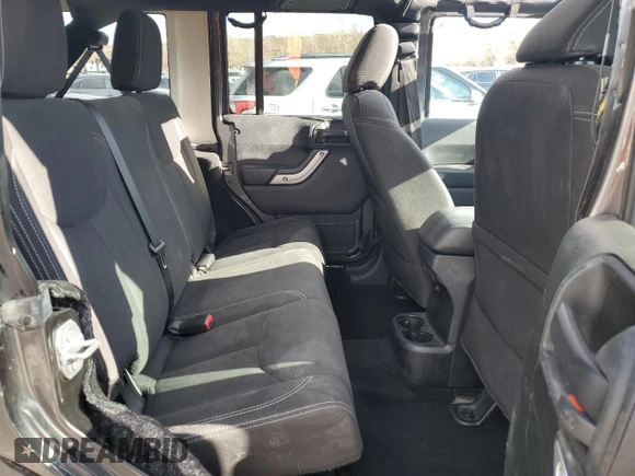 2017 Jeep Wrangler Unlimited Sahara with VIN 1C4HJWEG4HL615069, listed as a Copart auction lot 46480225 with 104,723 mi miles and Salvage title. Bid and sale history available at DreamBid. Image 11.