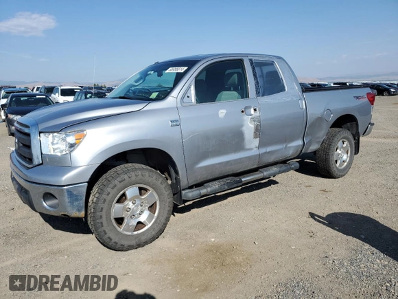 2010 Toyota Tundra 4WD Truck with VIN 5TFUM5F12AX004028, listed as a Copart auction lot 66986614 with 208,393 mi miles and Salvage Title. Bid and sale history available at carsss.com. Image 1.