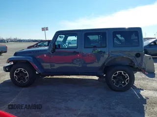 2015 Jeep Wrangler Unlimited Rubicon with VIN 1C4BJWFG7FL525724, listed as a IAAI auction lot 41394059 with 132,058 mi miles. Bid and sale history available at carsss.com. Image 15.