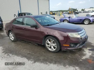 2012 Ford Fusion SE with VIN 3FAHP0HA3CR400074, listed as a Copart auction lot 59180065 with 168,416 mi miles and Salvage title. Bid and sale history available at DreamBid. Image 4.