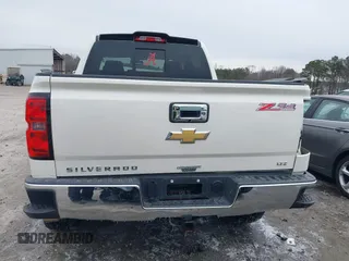 2014 Chevrolet Silverado 1500 LTZ with VIN 3GCUKSEJ3EG434991, listed as a IAAI auction lot 41385058 with 106,183 mi miles and . Bid and sale history available at DreamBid. Image 17.