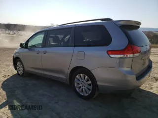 2012 Toyota Sienna LE with VIN 5TDJK3DC1CS031232, listed as a Copart auction lot 48513715 with 214,353 mi miles and Salvage Title. Bid and sale history available at carsss.com. Image 2.