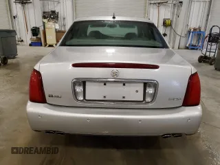 2005 Cadillac DeVille DHS z VIN 1G6KE54Y35U254893, wystawiony jako Copart lot #60356815 z przebiegiem 177 174 mil mil oraz Czysty tytuł • Clean title. Historia ofert i sprzedaży dostępna na DreamBid. Obrazek 6.